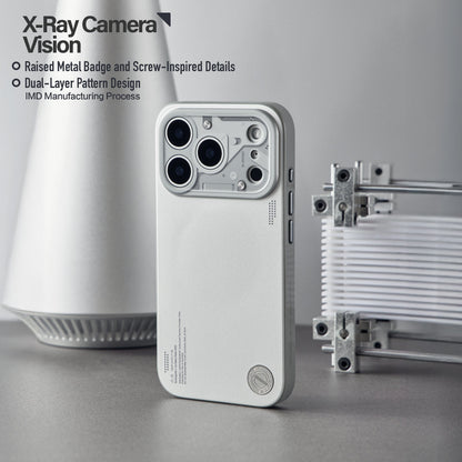 Chrome silver case standing beside metal rods, showing the raised camera surround