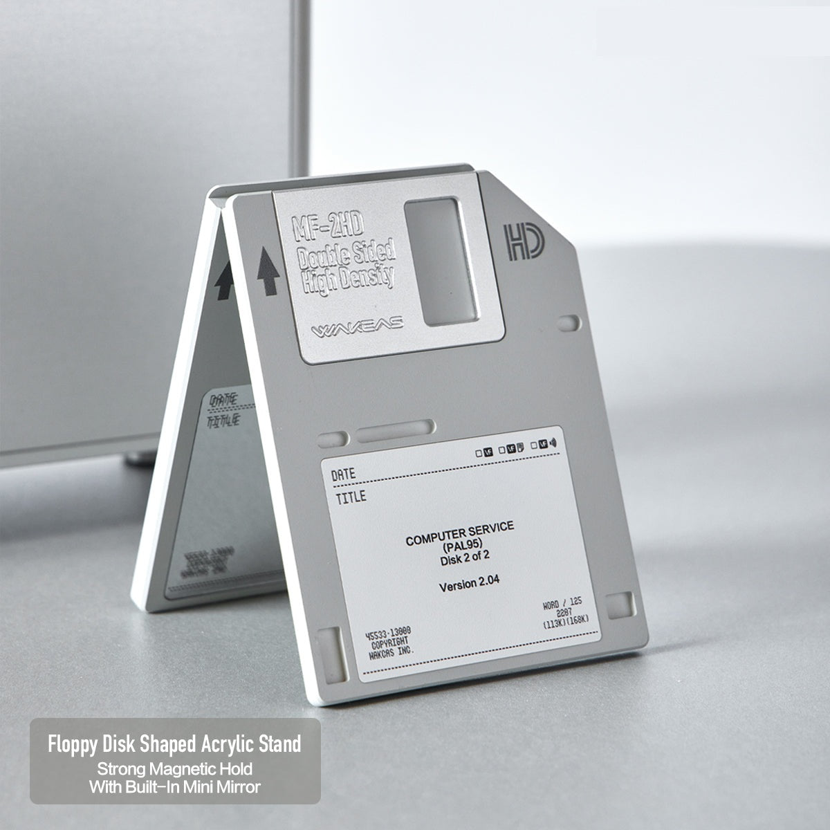 Floppy disk magnetic stand opened into an A-frame on a desk