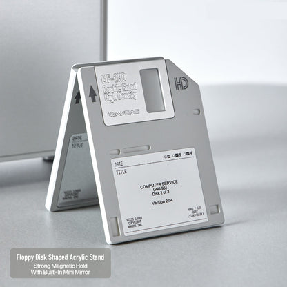 Floppy disk magnetic stand opened into an A-frame on a desk