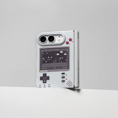 iPhone Duo in the retro console case standing upright against a gray wall