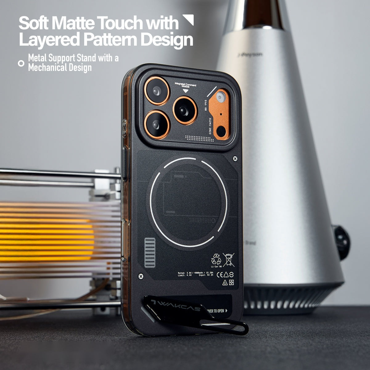 Black battery module case on an orange iPhone with matte touch callout
