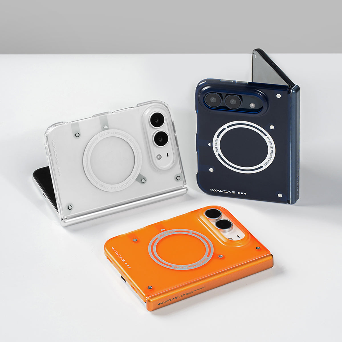 Transparent White, Blue and Orange cases on partially folded iPhone Duo phones