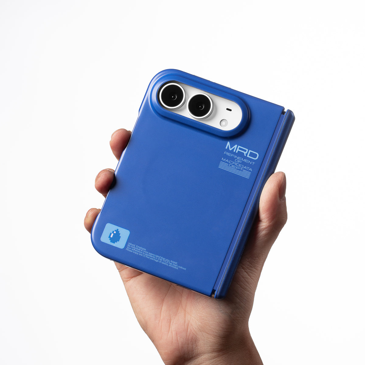 Hand holding an iPhone Duo in the matte blue case