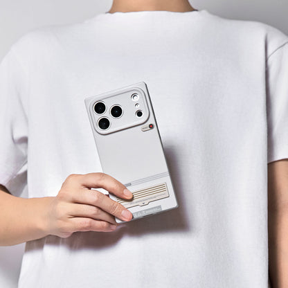 Person holding the gray retro terminal case