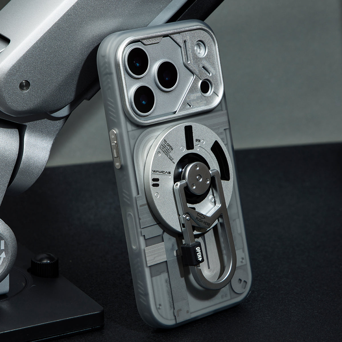 Case with round stand attached, close-up on a dark background