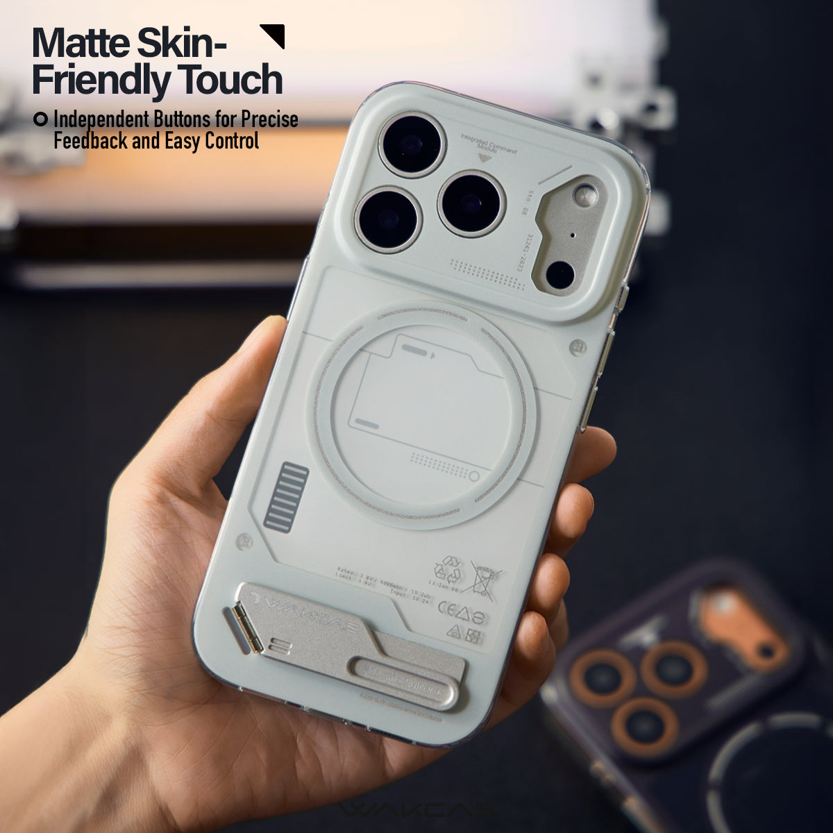 Hand holding the grey case, showing the independent side buttons