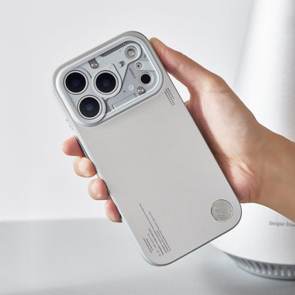 Hand holding the chrome silver MagSafe case