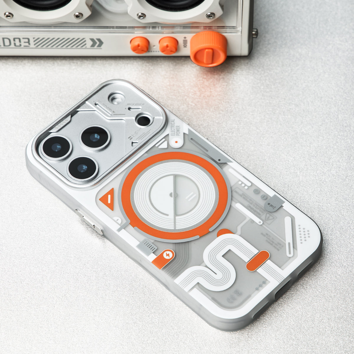 White and orange case lying flat, overhead view