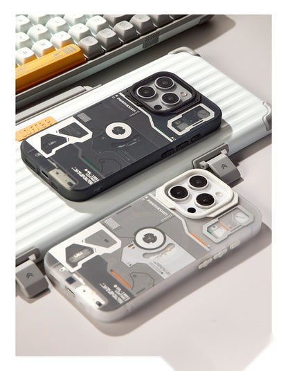 Retro player cases in black and gray laid flat near a keyboard