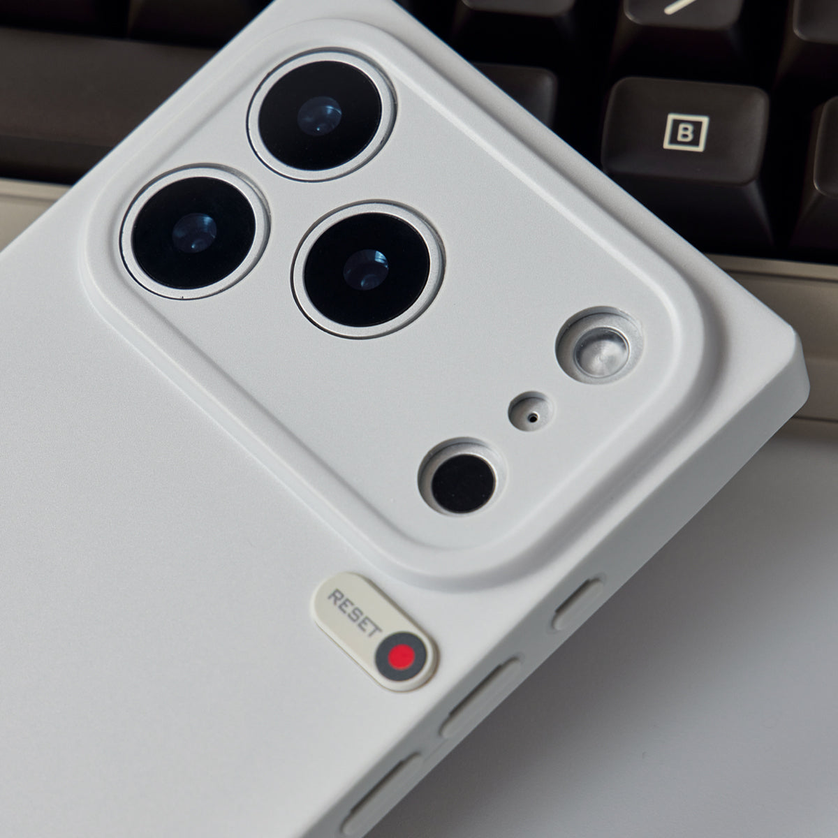 Close-up of the camera cutouts and red indicator-light decal