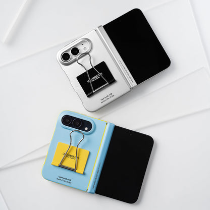 Silver and Blue cases on unfolded iPhone Duo phones lying on a white surface