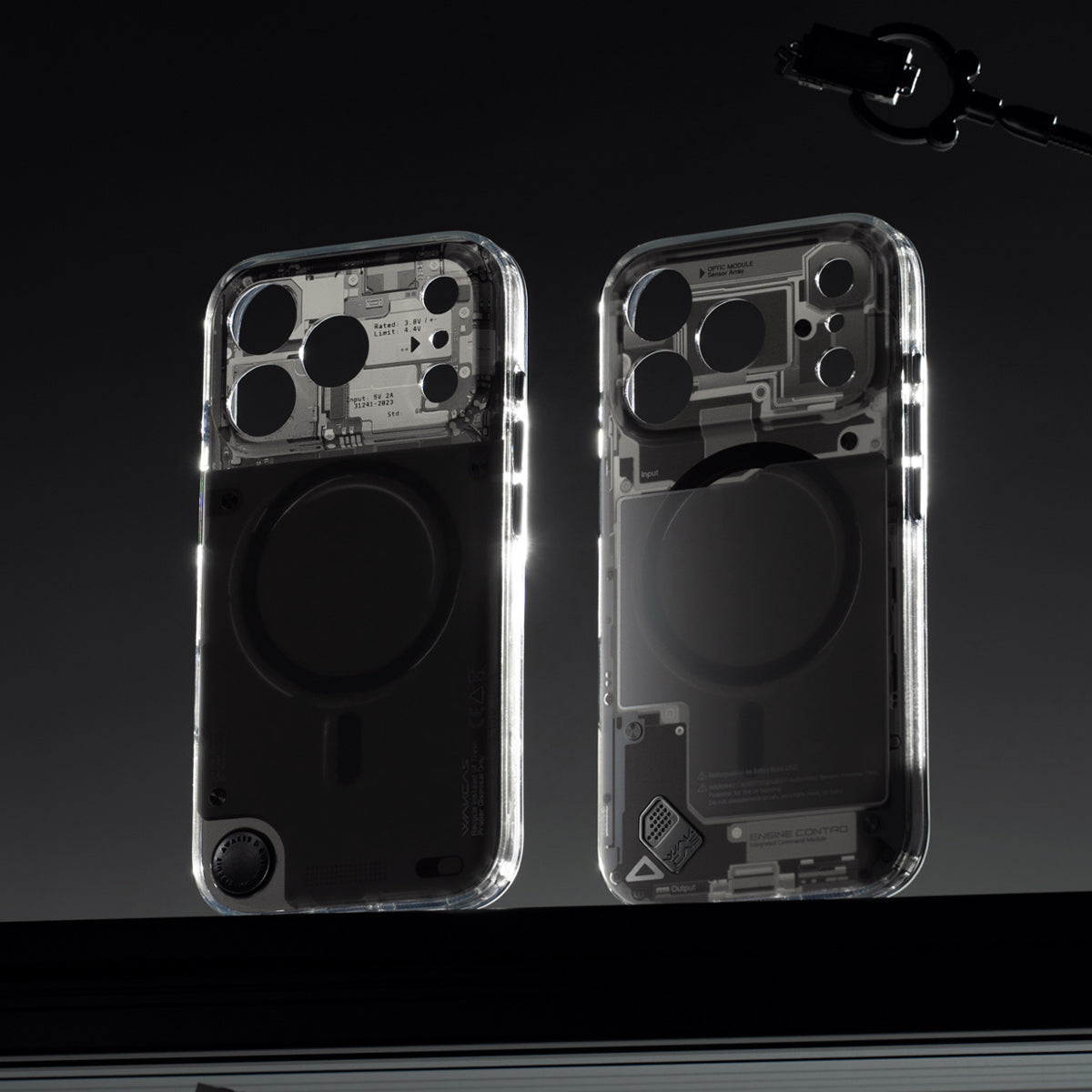 Two see-through cases on a dark background, rear view
