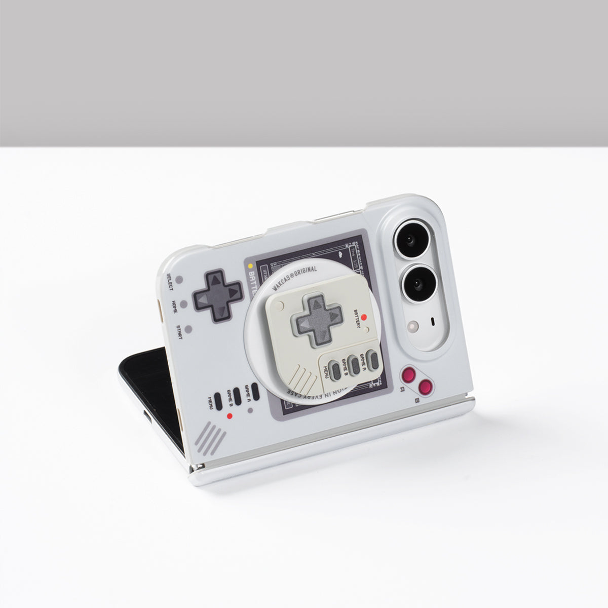 iPhone Duo propped up on the console-style magnetic stand on a white table