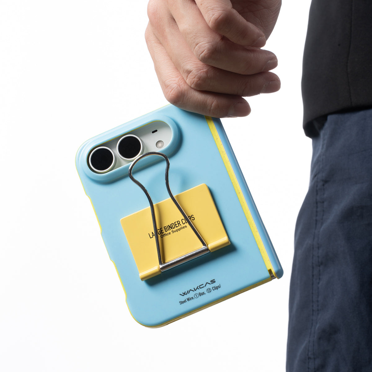 Hand carrying an iPhone Duo in the Blue file folder case