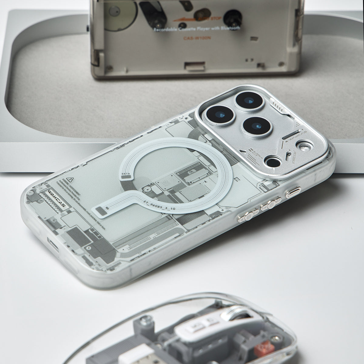 Grey circuit board case lying flat, showing the magnetic ring graphic