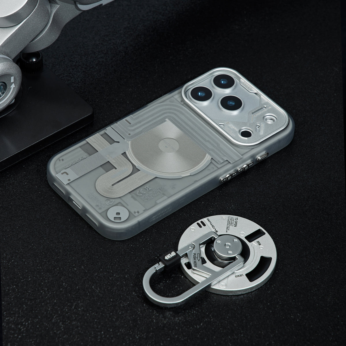 Frosted case lying flat next to the carabiner stand