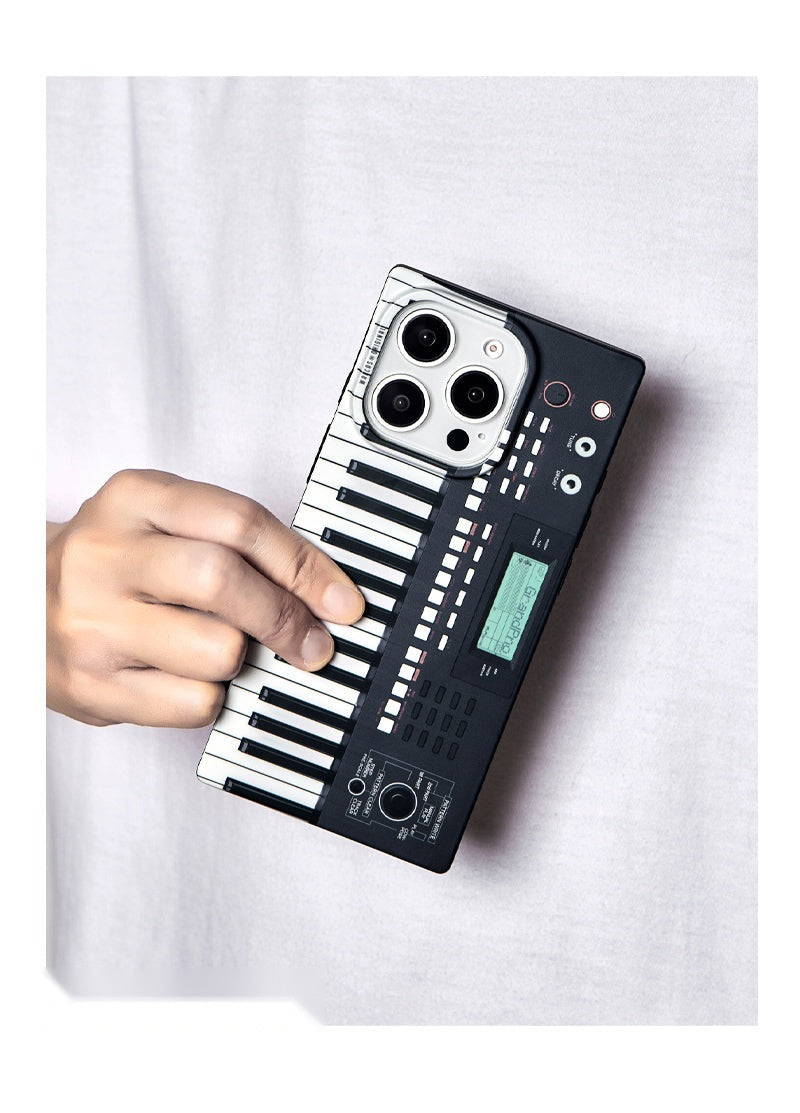 Hand pressing the keys printed on the black piano-key case