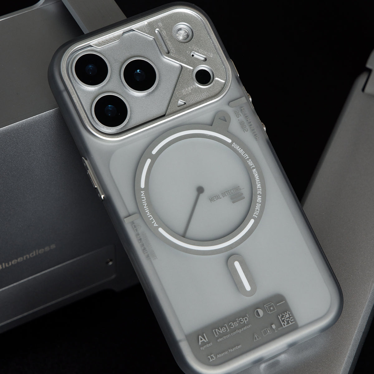 Close-up of the frosted gray back panel and metal camera frame