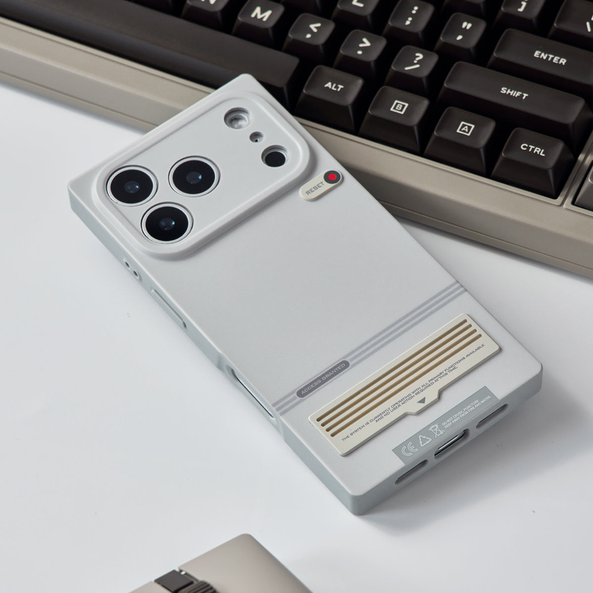 Retro terminal case lying on a keyboard