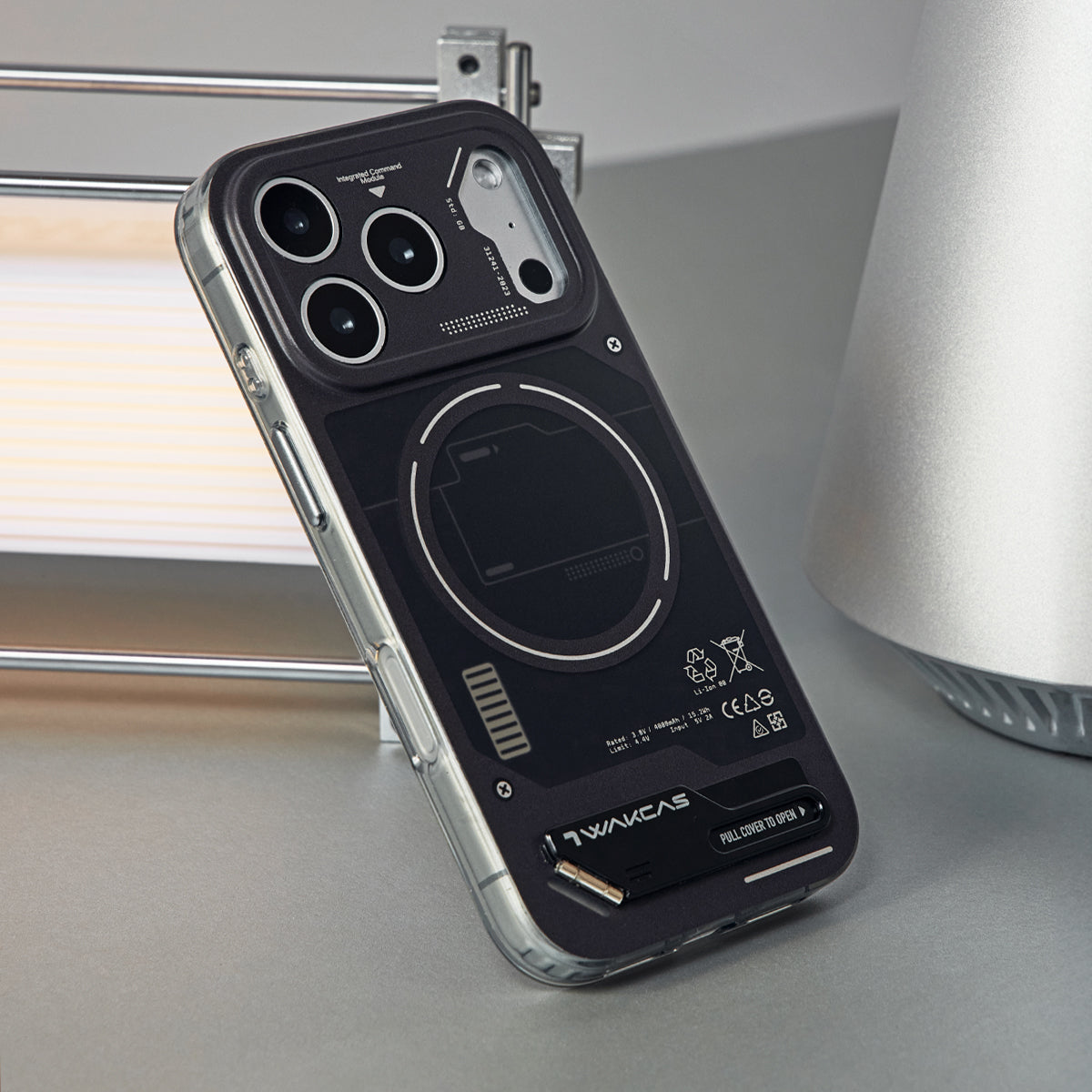 Black battery module case standing upright on a desk