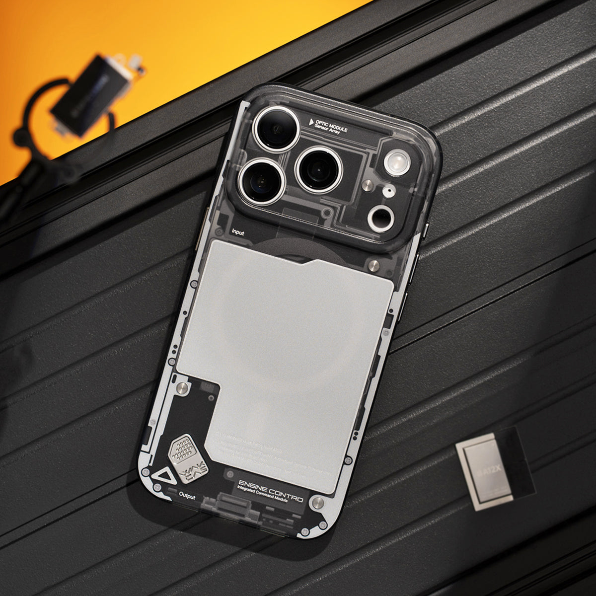 Black see-through case on a ribbed black surface