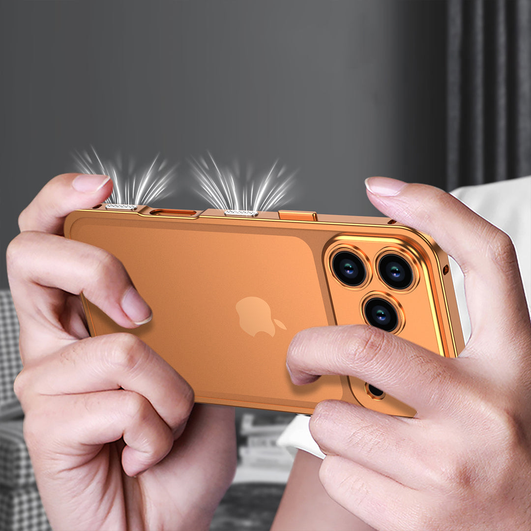 Hands holding a phone in an orange metal bumper in landscape