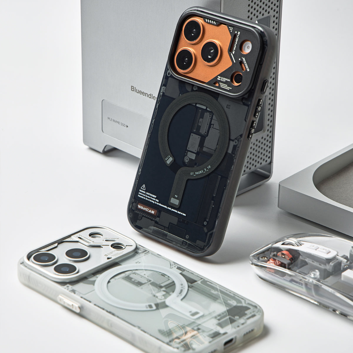 Black and grey circuit board cases styled with desktop computer props