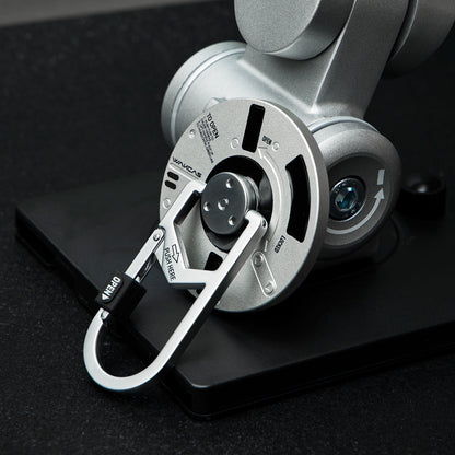 Round magnetic stand close-up with carabiner loop
