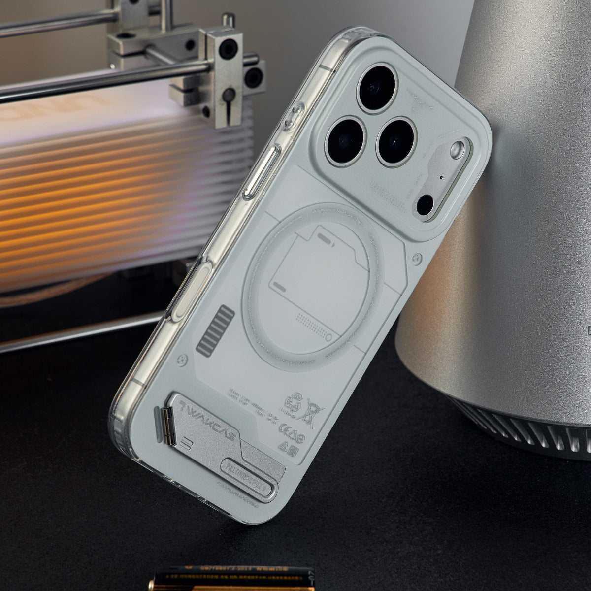 Grey battery module case leaning against a lamp, angled