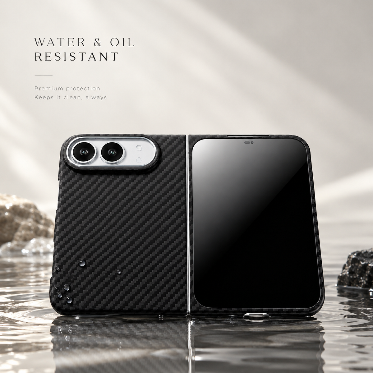 Black aramid fiber iPhone Duo case unfolded beside water