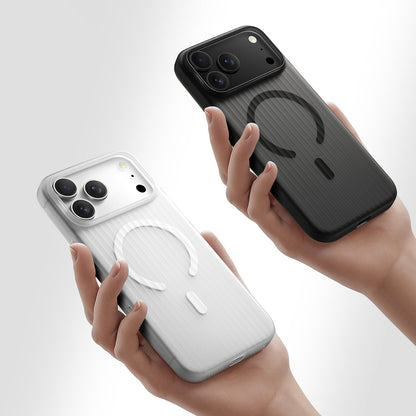 Two hands holding white and black striped MagSafe iPhone cases