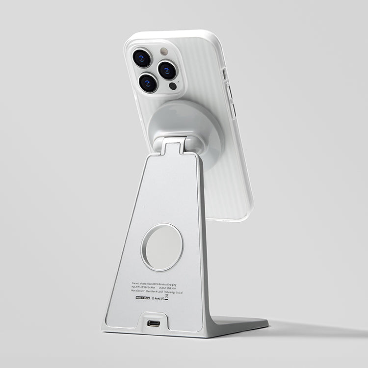 White striped iPhone case attached to a magnetic desk stand