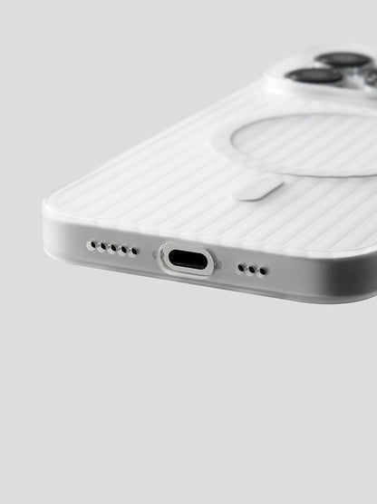 Close-up of the bottom edge and port cutout of a white striped iPhone case