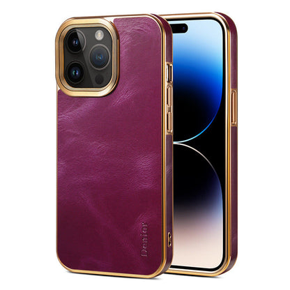 Purple leather-look iPhone case with gold-tone edge and raised camera surround