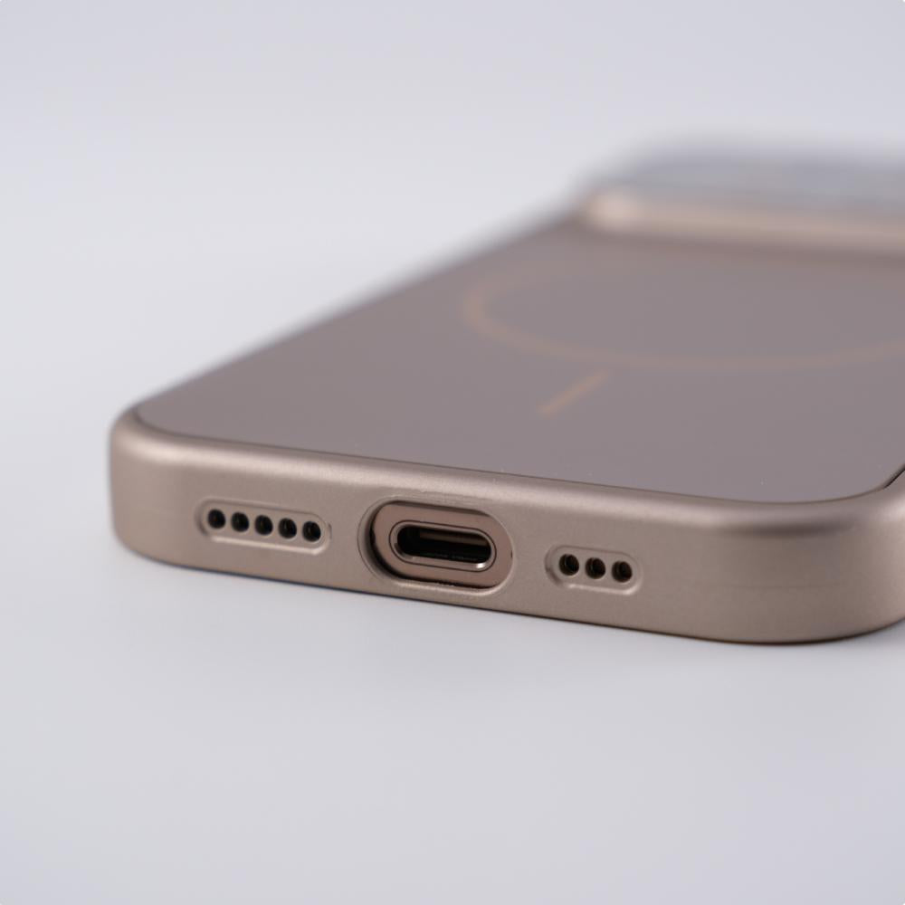 Bottom edge of slim matte iPhone case with charging port and speaker cutouts