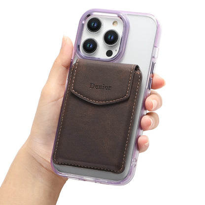 Hand holding a phone with the brown flap card holder attached to the back
