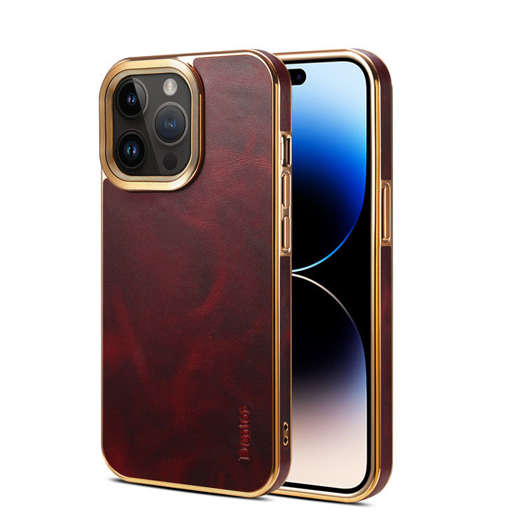 Red leather-look iPhone 16 series case with gold-tone edges shown on the back of the phone