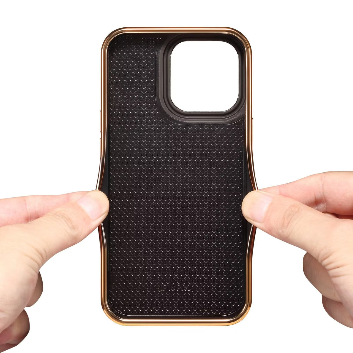 Inside of the case held in two hands, showing the textured inner lining and gold-tone rim