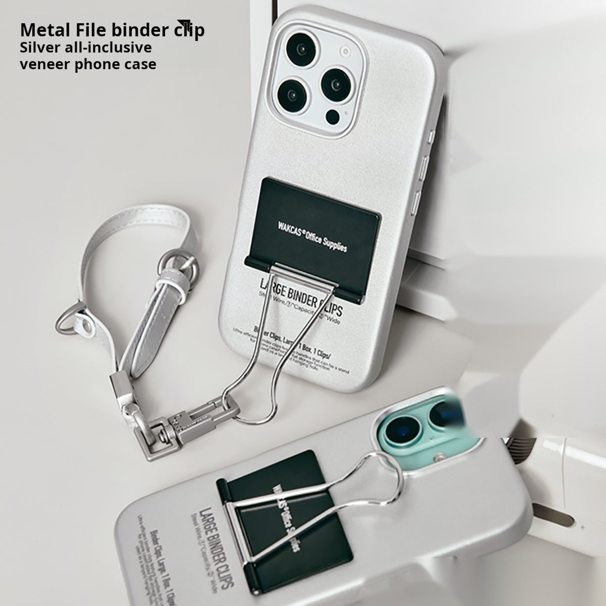 Binder clip cases in white and gray with the silver strap attached
