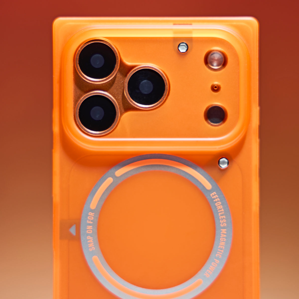 Close-up of camera area and screw accents on orange square case