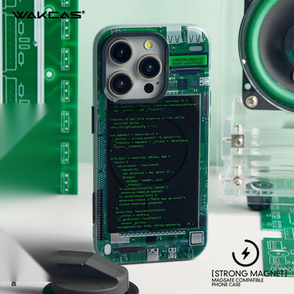 Green circuit board case lying on a desk beside circuit boards
