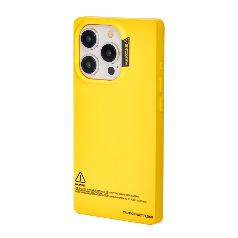 Yellow square case with caution label print, angled view